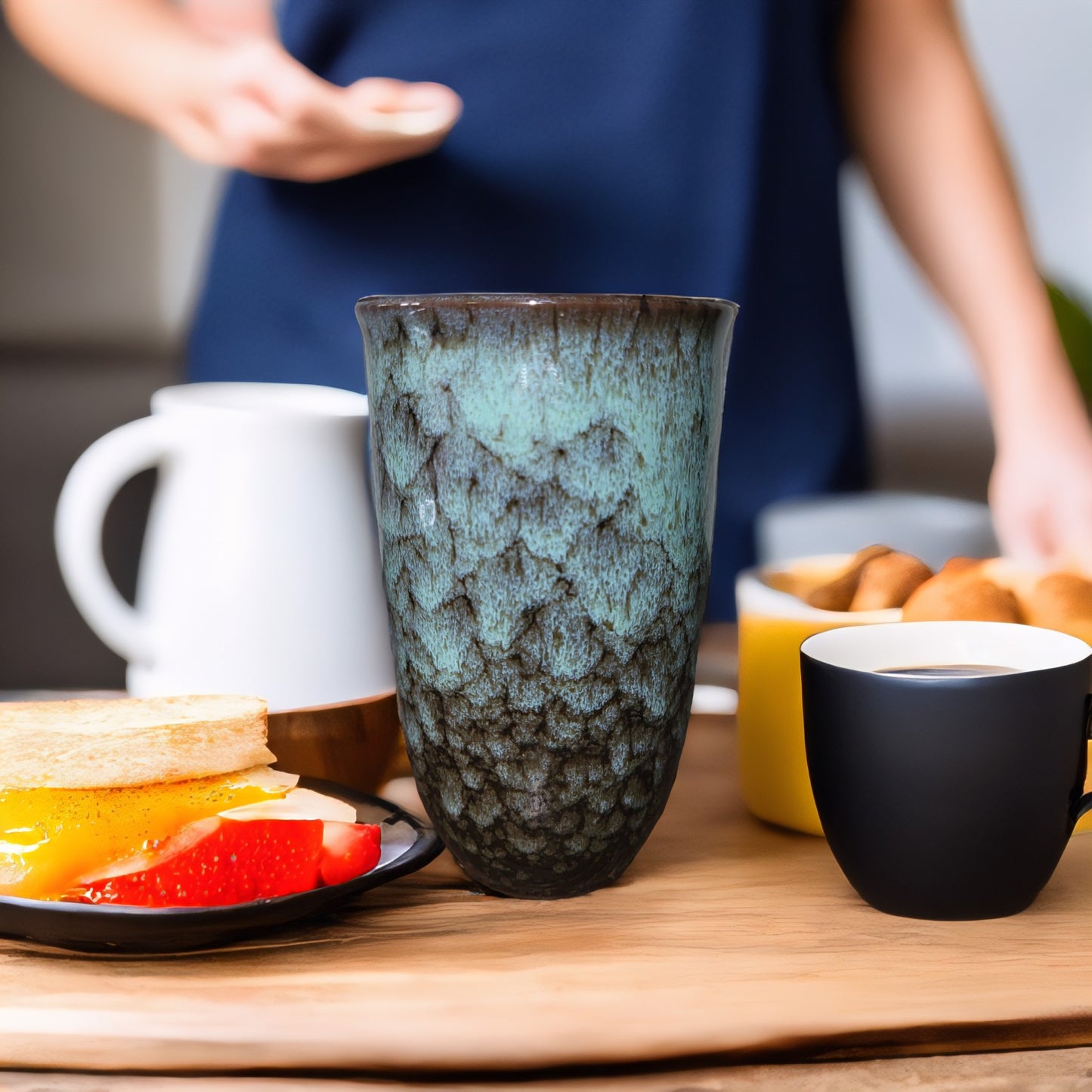 Lariwo koffie 2 go mok groen op de ontbijt tafel